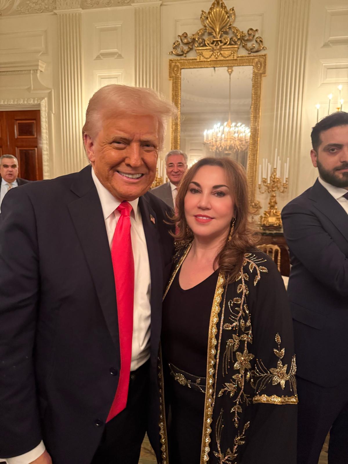 President Trump with Maissa Kabbani.